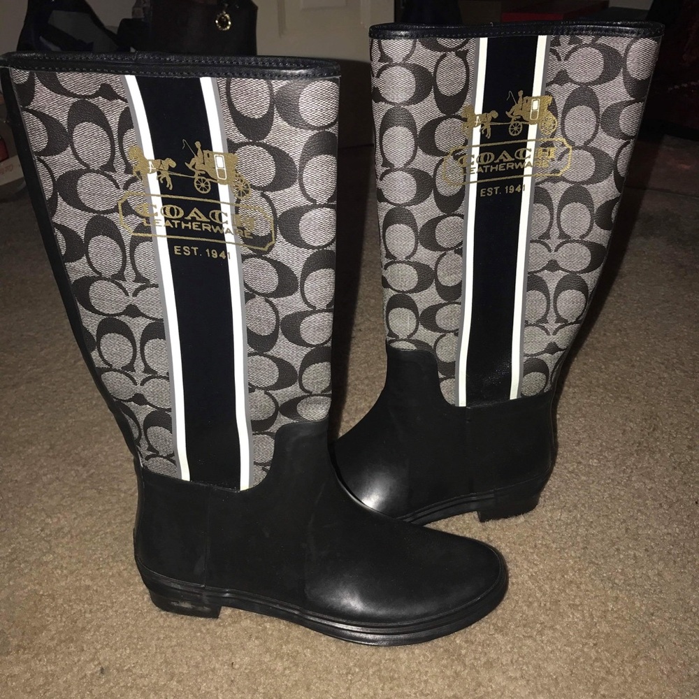 Sold Brand new never worn size 7 coach rain boots
